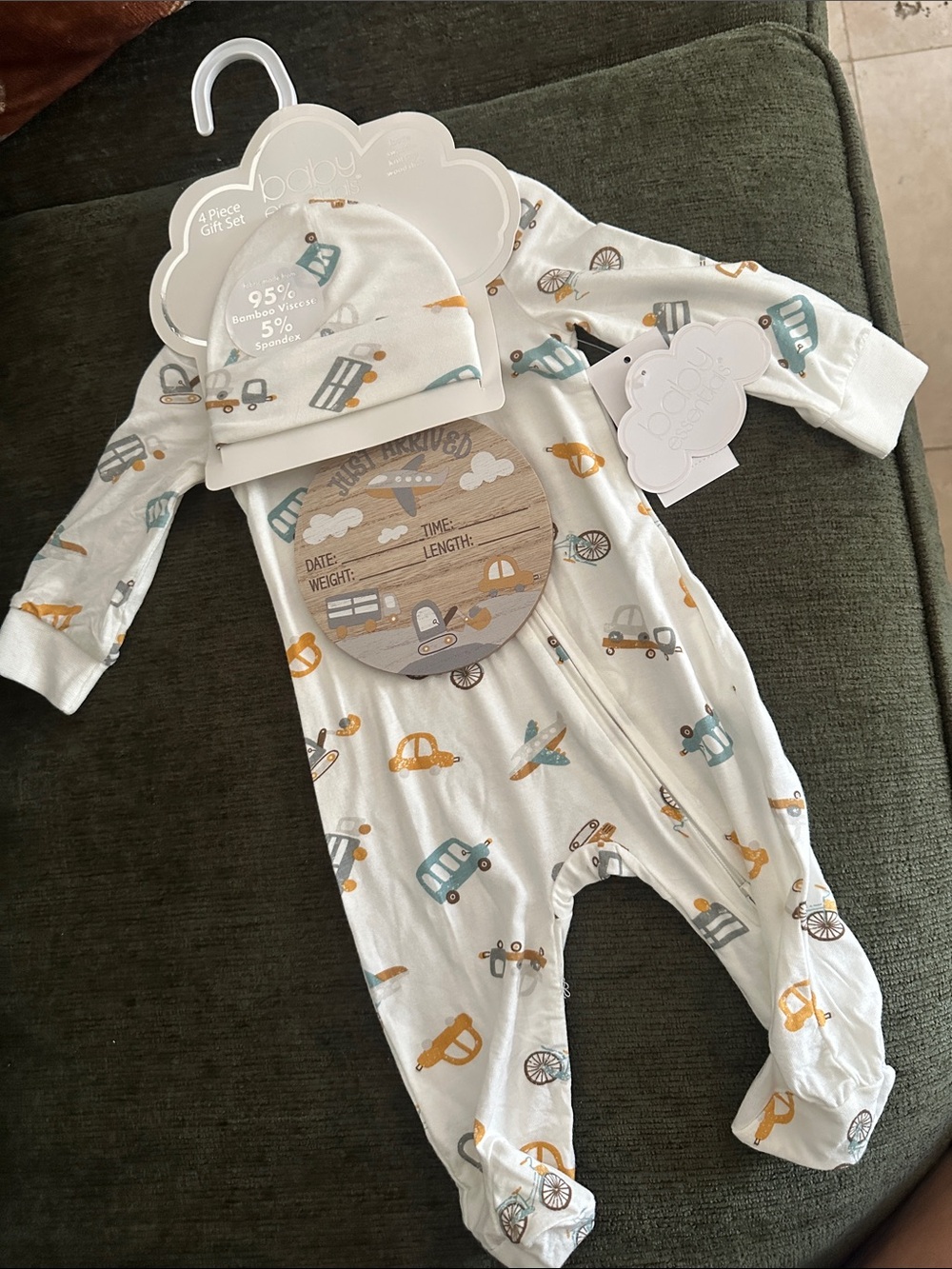 Baby Essentials Cream Footed One-Piece with Blue and Yellow Vehicle Print